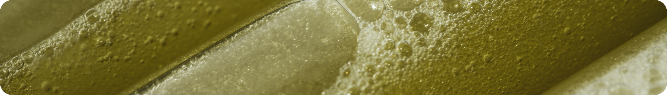 close-up of DELTA liquid inside bottles